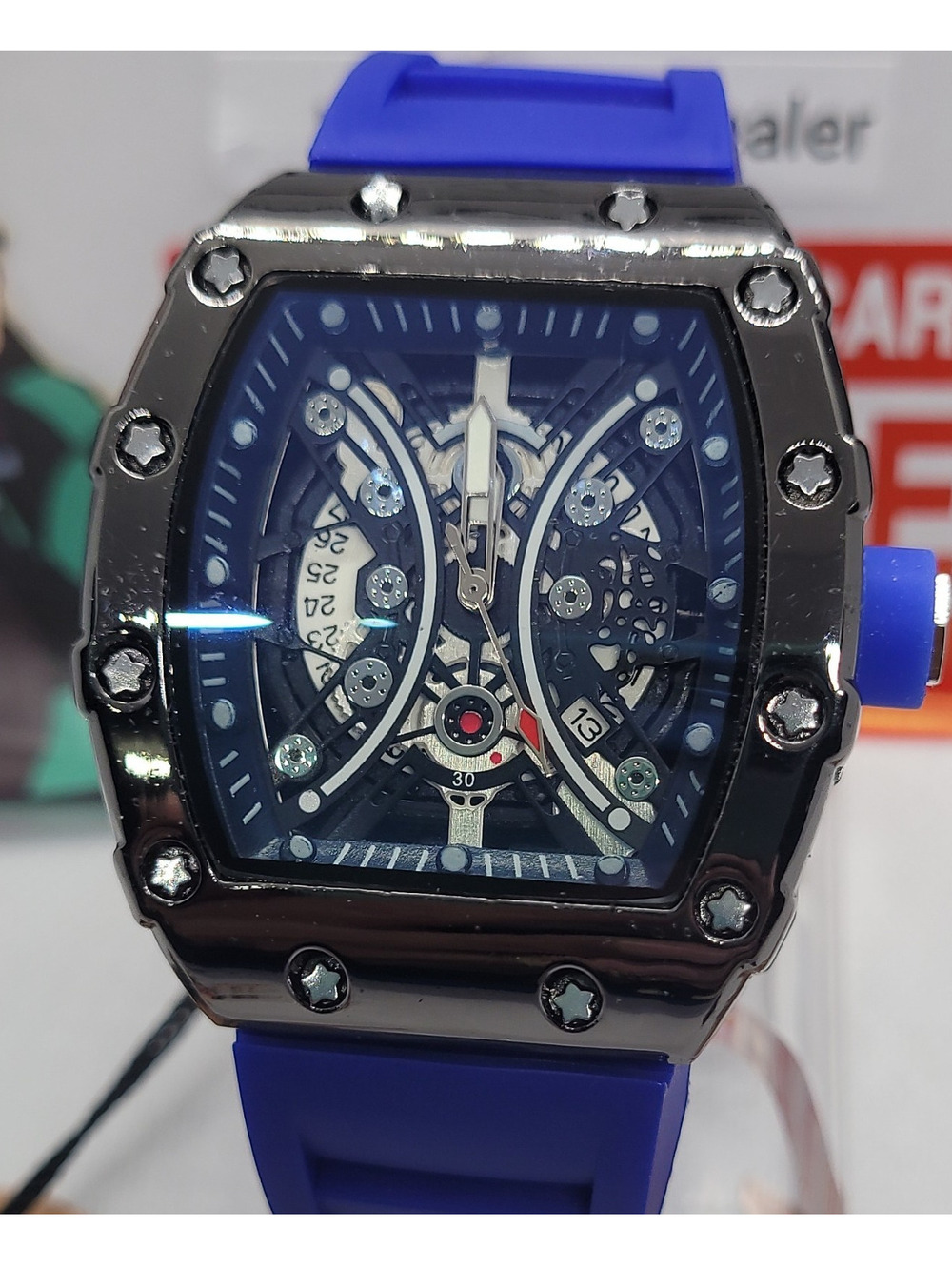 330 AJ Skeleton Dial Blue Silicone Strap Barrel-Shaped Polished Black Analog